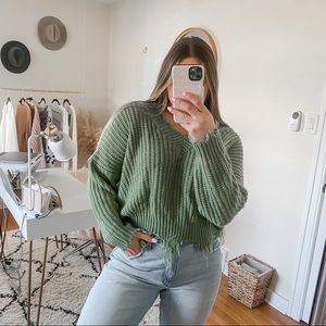 Main strip green sweater